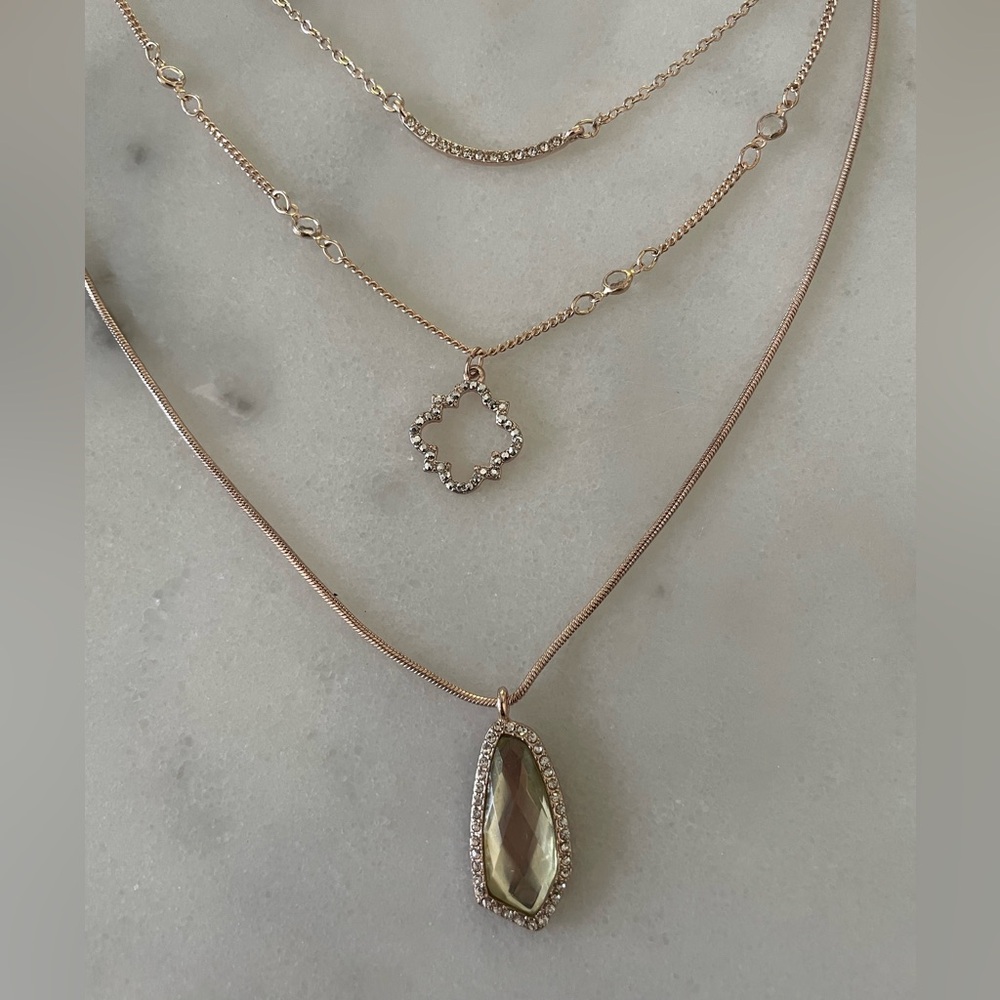 Charming Charlie Rose gold trio 3 chain necklace diamonds and yellowishgreen gem